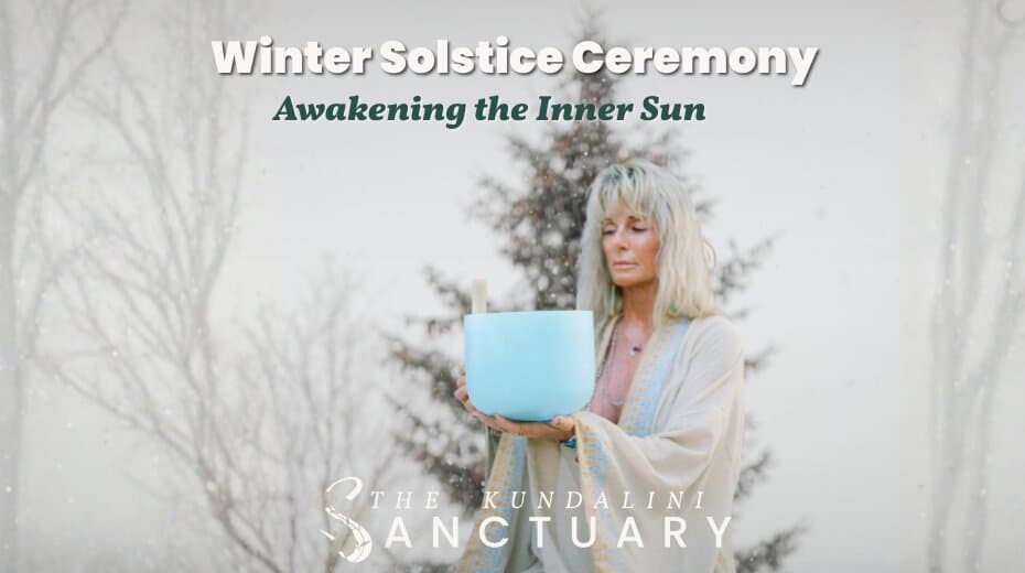 Woman in serene outdoor setting holding a blue singing bowl during The MataJi Sanctuary's Winter Solstice Ceremony.